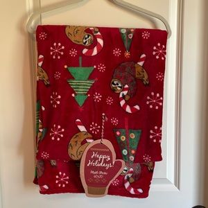 Red sloth Christmas throw.